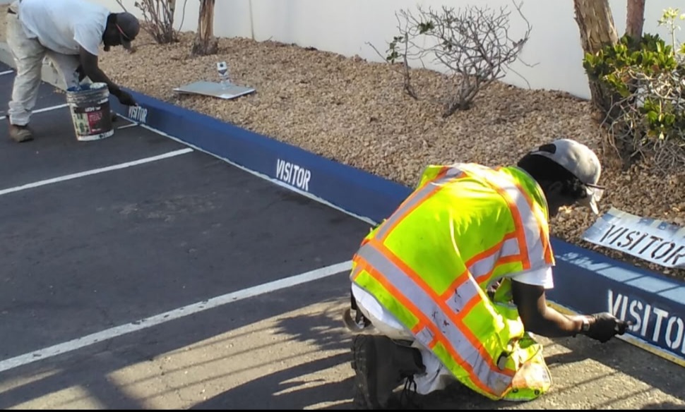 Detailed Curb Stenciling at Parking Stalls in Corona, CA